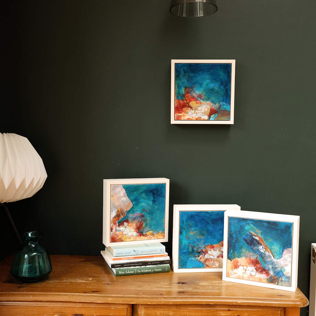 Land of the Gods series shown all-together. I is on the wall, II, III and IV are sat on a desk